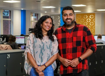 Two coworkers standing