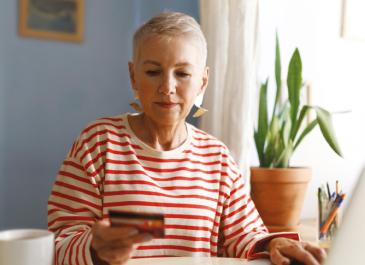 Woman holding credit card