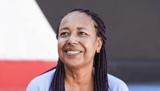 A woman smiling