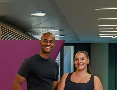 Two coworkers standing