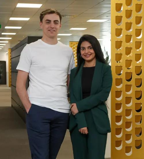 Two colleagues standing