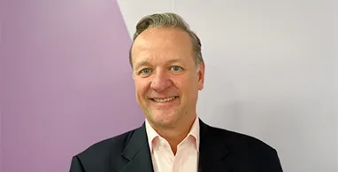 Headshot of Dominic Holland, director of market oversight